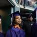 A graduate looks out into EMU's Convocation Center as she marches out during the start of Pioneer's 2013 graduation ceremony, Thursday, June 6.
Courtney Sacco I AnnArbor.com 